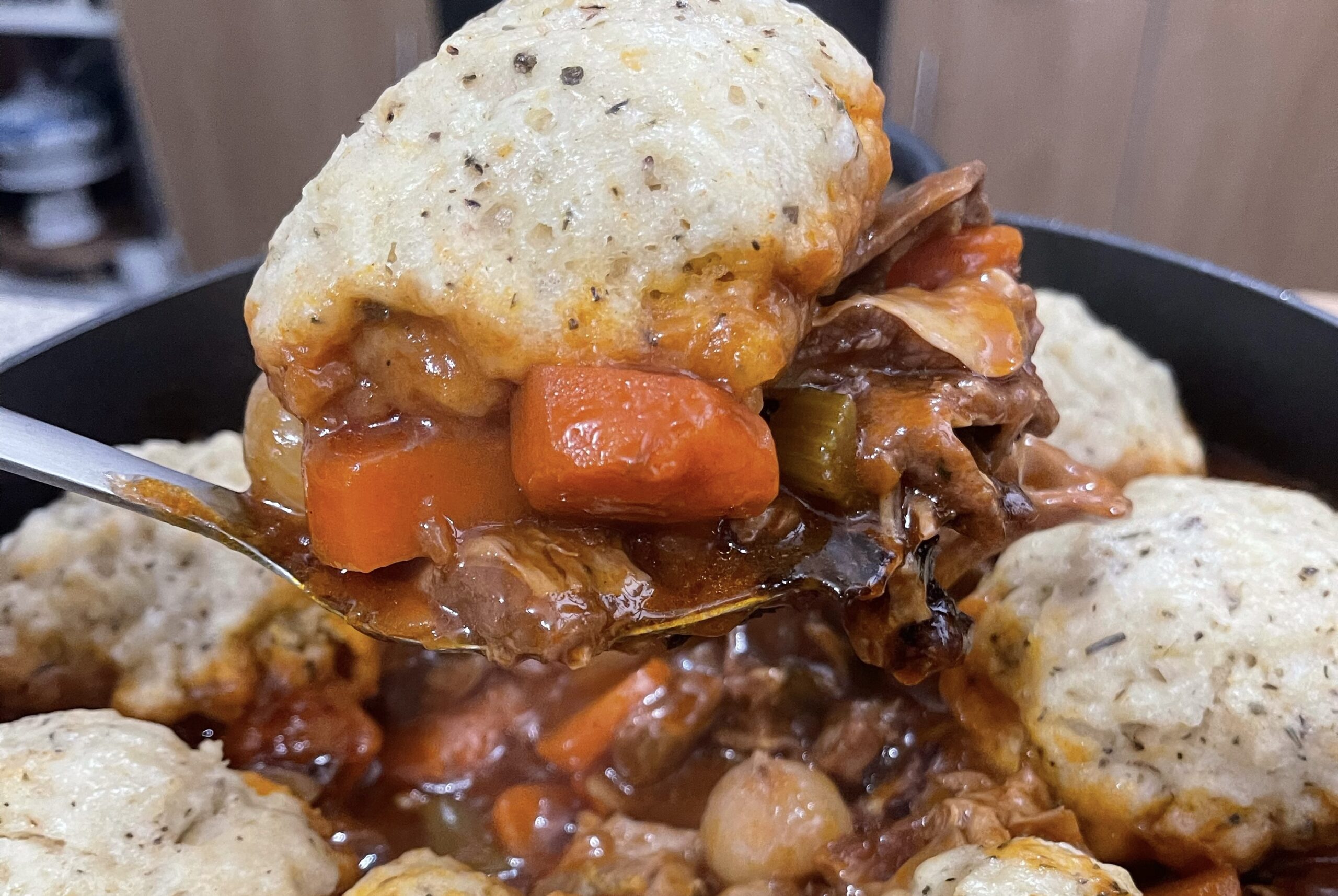 Lamb stew and herby dumplings